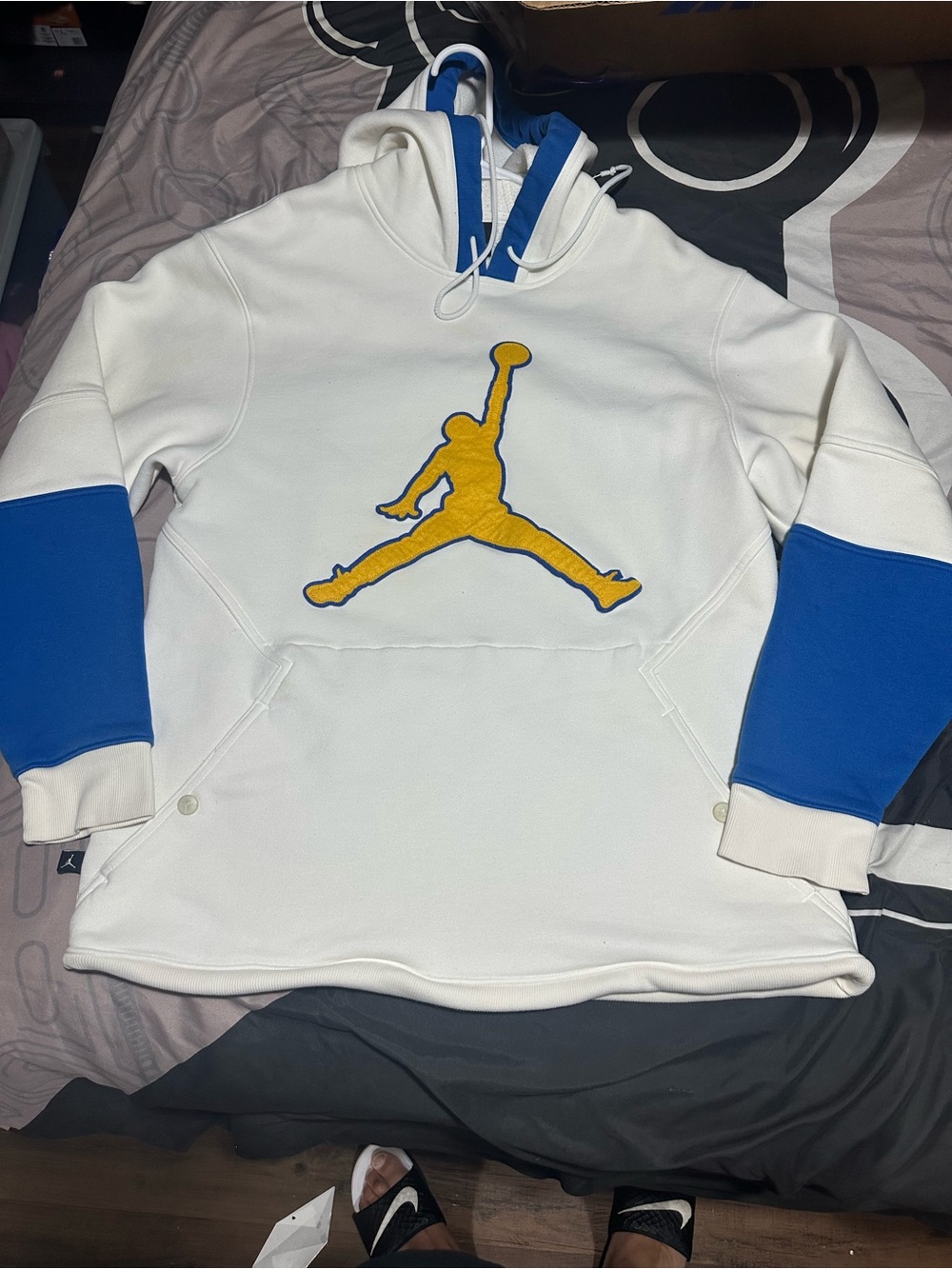 Jordan White Crewneck Sweater with Blue Panels and Gold Jumpman